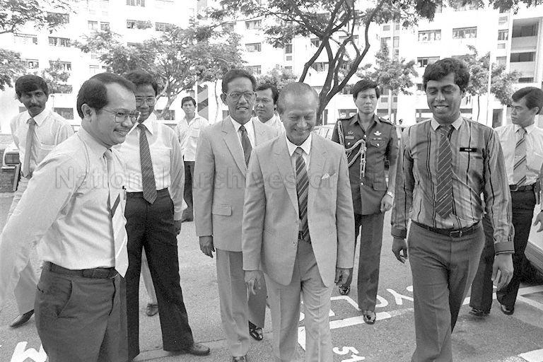 President Wee Kim Wee arriving at Taman Bacaan Child Care and Development Centre at Block 542, Bedok North Street 3. Front from left are Political Secretary to Ministry of Community Development Zulkifli Mohammed, Parliamentary Secretary to Ministry of Trade and Industry Haji Sidek Saniff, Environment Minister and Minister in-charge of Muslim affairs Dr Ahmad Mattar, Mr Wee, and President of Taman Bacaan or Singapore Malay Youth Library Association Abdul Halim bin Kader.