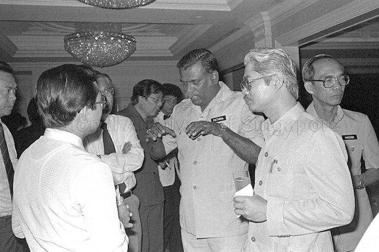 Malaysian Deputy Minister for Transport Datuk Abu Hassan Haji Omar (right) and Malaysian Deputy Minister for Health Datuk K Pathmanaban (second from right) during their visit to Jurong Town Corporation. The Malaysians are in Singapore as part of the delegation accompanying Malaysian Deputy Prime Minister Datuk Musa Hitam who is on a three-day official visit to Singapore.