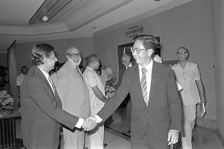 Minister of State for Labour Dr Wong Kwei Cheong (right) exchanging handshakes with members of Singapore Indian Chamber of Commerce during their annual general meeting held at Hyatt Hotel