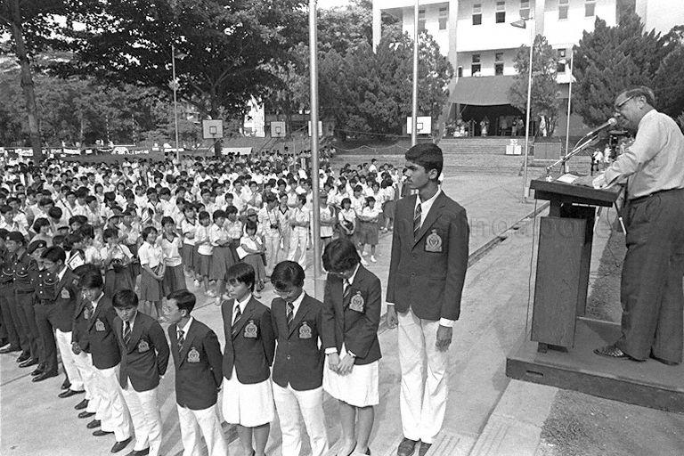 Principal of Raffles Junior College R W Mosbergen addressing students during opening of food and funfair in celebration of 160th anniversary of Raffles Institution at the college grounds in Paterson Road