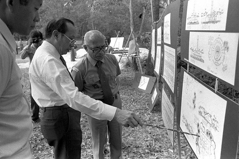 President Devan Nair, also Chief Scout of Singapore Scout Association, looking at exhibits displayed at Sarimbun Scout Camp.