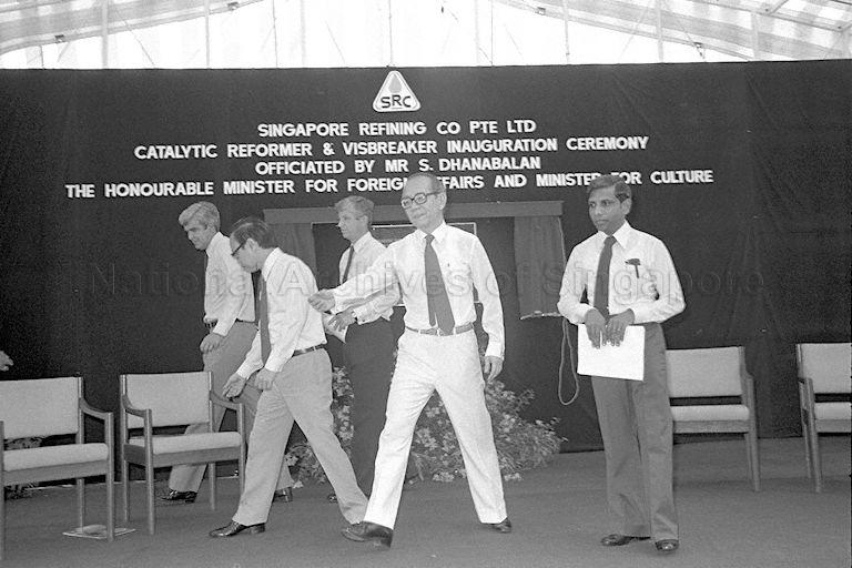 Senior officials of Singapore Refining Company (SRC) going back to their seats after taking group photographs with Minister of Foreign Affairs and Culture S Dhanabalan (right) during the inauguration ceremony of two new secondary plants built at $250 million - a 12,000-barrel-a-day catalytic reformer and a 29,000-barrel-per-day visbreaker on Pulau Merlimau. Second from right is Chairman of SRC Tan Boon Teik, who is also the Attorney-General. The three partners in the SRC consortium comprises British Petroleum, Caltex and Singapore Petroleum Company.
