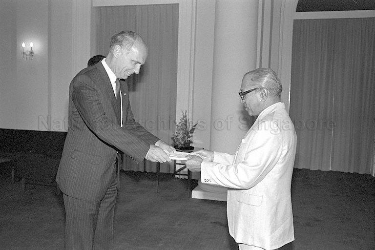 Netherlands Ambassador Pieter Adriaan van Buuren (left) presenting his credentials to President C V Devan Nair at Istana. He is a career ambassador who has served in Vienna, Hong Kong, Jerusalem, London, Canberra and at the United Nations.