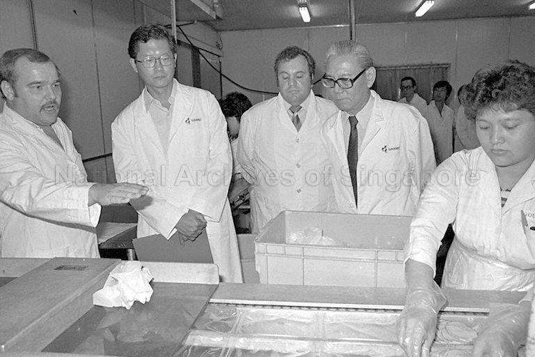 Minister of State for Education and Minister-in-Charge of Vocational and Industrial Training Board (VITB) Dr Tay Eng Soon (second from left) touring Cold Storage Gourmet Foods factory at 18 Chin Bee Avenue. The visit with his team of VITB board members and officers aims to familiarise them with the running of companies in the industry as well as to obtain feedback on skill requirements, staff recruitment and training. Dr Tay is accompanied by Senior Business Manager of Cold Storage Trading John Rhodes (foreground, centre).
