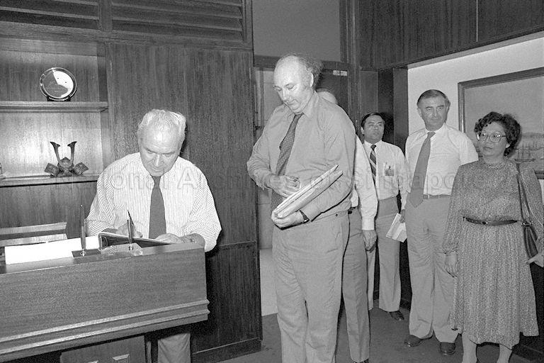 Sir William van Straubenzee, a Conservative Member of Parliament in the United Kingdom, signing a register during a courtesy call on Acting Minister for Communications and Minister of State for Defence Dr Yeo Ning Hong (not in picture) at Minister of Defence. The British team of three Conservative and three Labour Members of Parliament (MP) is here to learn how Singapore tackles its housing, economic and unemployment problems, and how it relates education to commerce during a five-day stay.