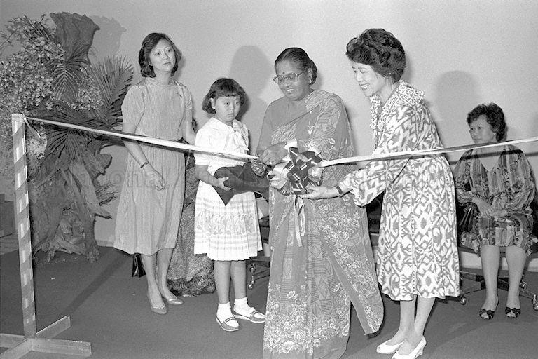 First Lady Mrs C V Devan Nair cutting ribbons to mark the