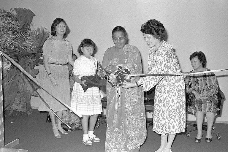 First Lady Mrs C V Devan Nair cutting ribbons to mark the