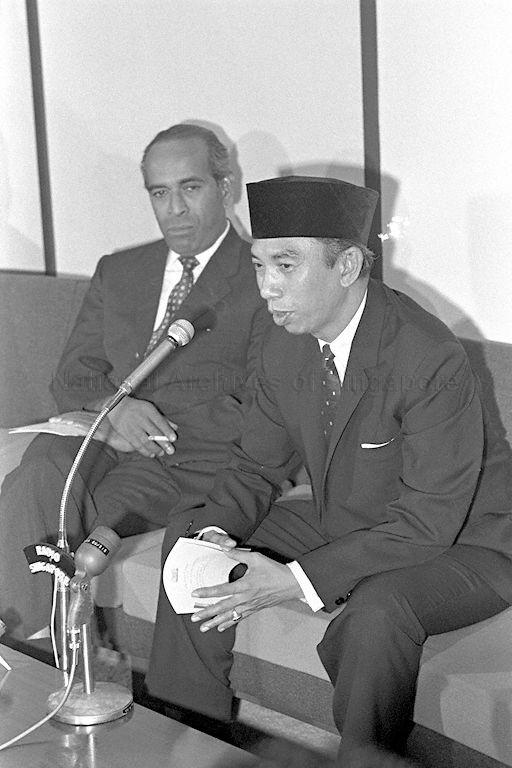 Indonesian Foreign Minister Adam Malik (right) giving a press conference at Singapore Paya Lebar airport. Beside Mr Malik, who is here for a three-day official visit, is Minister for Foreign Affairs S Rajaratnam.