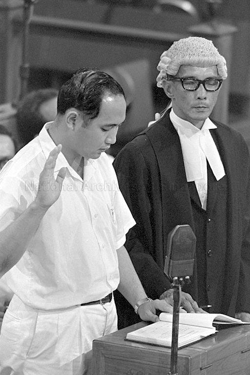 Parliamentary Secretary to the Minister for Education and Member of Parliament for Farrer Park, Dr Lee Chiaw Meng taking the oath of allegiance at the first meeting of Singapore Parliament in Parliament House, Empress Place