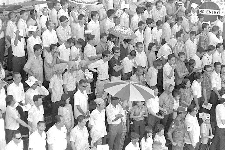 National Day Parade 1968 at the Padang - Spectators watching parade