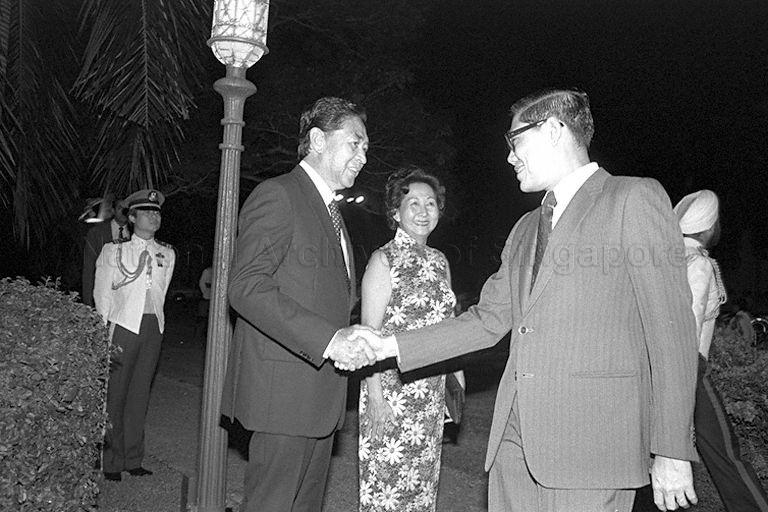 Acting President Dr Yeoh Ghim Seng and his wife welcoming Minister for Home Affairs Chua Sian Chin during National Day reception at Istana