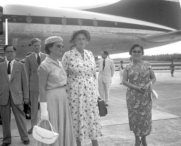 Lady Dorothy Macmillan (centre), wife of British Prime Minister, arriving at Singapore Paya Lebar Airport. She is flanked by Lady Goode (left), wife of Governor of Singapore, and Mrs Lim Yew Hock, wife of Chief Minister (left).