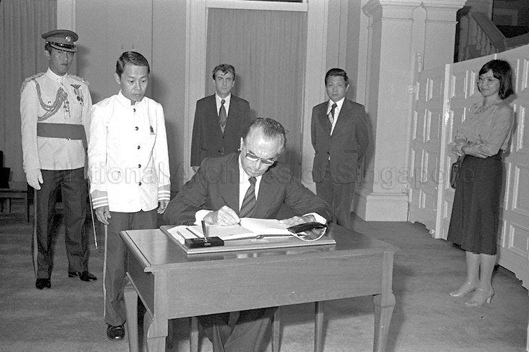Ambassador-designate of Bulgaria to Singapore Dr Matey Karasimeonov signing guest book when he arrives at Istana main building to present credentials to President Dr Benjamin Henry Sheares