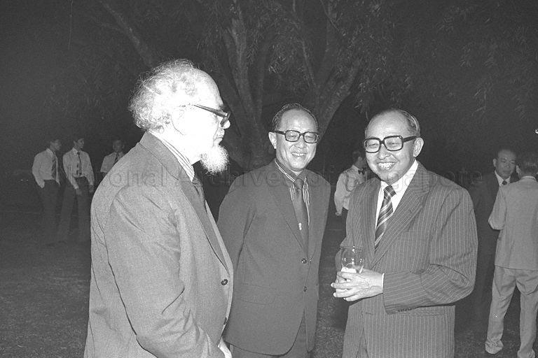 Minister for National Development Teh Cheang Wan (right) with guests at National Day reception held at Istana