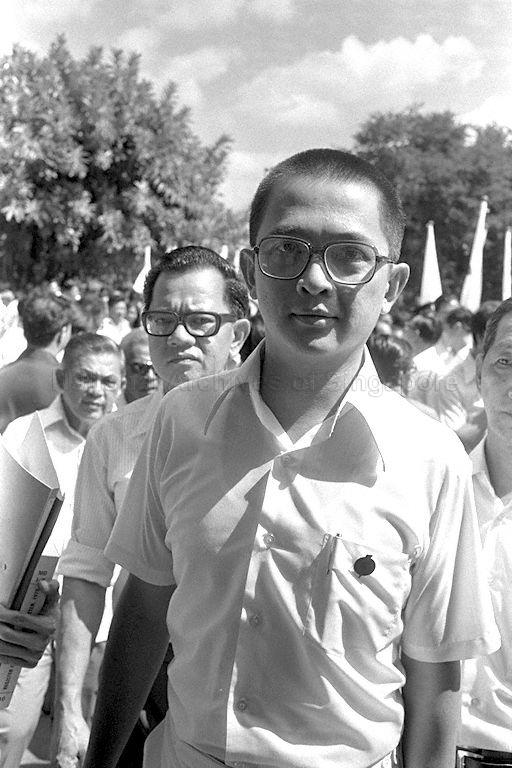 People's Action Party (PAP) candidate for Mountbatten Eugene Yap (foreground) arriving at the nomination centre at Victoria School to file his papers