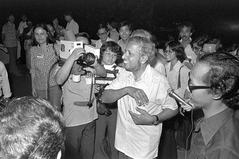 By-election 1979 -  Workers' Party candidate for Telok Blangah J B Jeyaretnam, who is also the party's secretary-general, being surrounded by reporters at the counting centre in Victoria School.