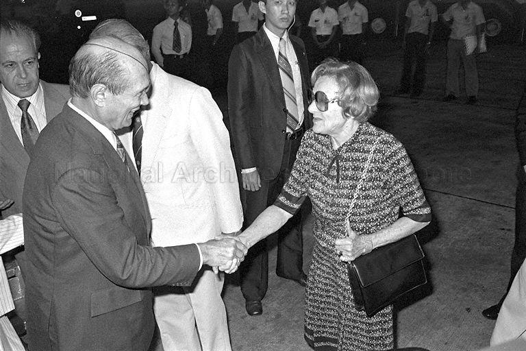 Mrs Piroska Rajaratnam, wife of Foreign Minister S Rajaratnam, greeting Israeli Foreign Minister, Moshe Dayan upon his arrival at Singapore Paya Lebar airport.  Mr Dayan who arrived from Hong Kong is here on a three-day official visit.