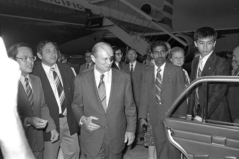 Israeli Foreign Minister, Moshe Dayan, is escorted by Chief of Protocol, Tan Keng Jin during the welcome ceremony at Singapore Paya Lebar airport.  Mr Dayan who arrived from Hong Kong is here on a three-day official visit.