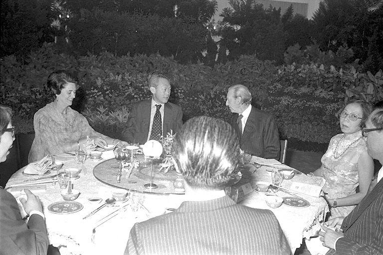 Prime Minister Lee Kuan Yew is flanked by United Nations (UN) secretary-general Dr Kurt Waldheim, and his wife Elizabeth Waldheim during a state dinner in the Istana. Dr Kurt Waldheim who is accompanied by a six-member UN delegation is on the second last leg of a month-long Asian tour to appraise the political and economic developments in the region.