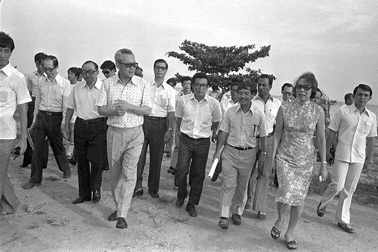 Prime Minister Lee Kuan Yew touring East Coast Park after planting a sea putat for Tree Planting Day. He is accompanied by Mrs Lee, Minister for National Development (MND) Teh Cheang Wan (third from left), Chairman of Duxton Plain Community Centre Management Committee Bay Guan Chiang (on Mr Lee's left), Commissioner of Parks and Recreation Department Wong Yew Kwan (on Mrs Lee's right) and other officials.