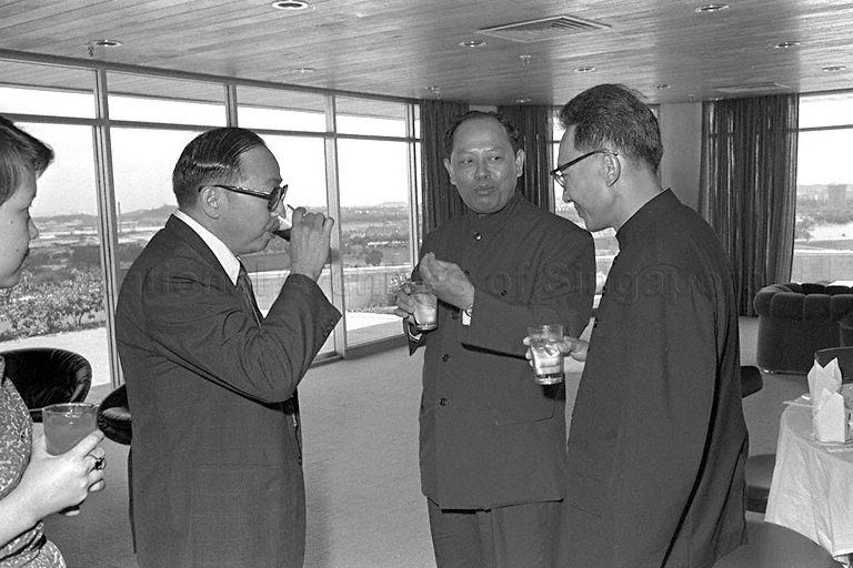 Acting Chairman of Jurong Town Corporation (JTC) Teh Cheang Wan (left) with Deputy Prime Minister for Foreign Affairs of Democratic Kampuchea (now Cambodia) Ieng Sary (centre) and his delegation at a reception preceding the lunch hosted for the visiting Kampuchean minister