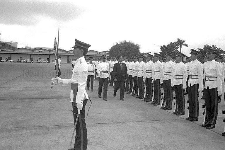 Thai Prime Minister (PM) General Kriangsak Chomanan inspecting guard of honour for ceremonial send-off at Paya Lebar Airport, after his three-day official visit to Singapore