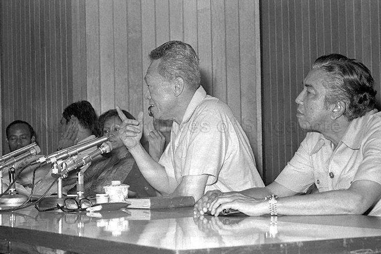 Prime Minister (PM) Lee Kuan Yew speaking at question-and-answer session during the Singapore Malay Teachers' Union (SMTU) Seminar on "Facing Educational Challenges in the 1980's" at Development Bank of Singapore (DBS) Auditorium. Seated on PM Lee's left is Senior Minister of State for Foreign Affairs Rahim Ishak.