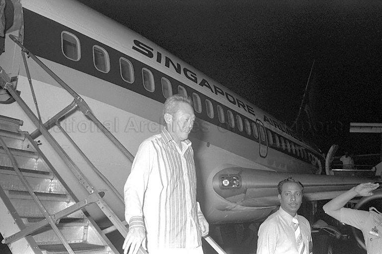 Prime Minister Lee Kuan Yew stepping down from the Singapore Airlines' aircraft at Paya Lebar Airport on his return from a three-day meeting with President Suharto of Indonesia at the resort island of Bali