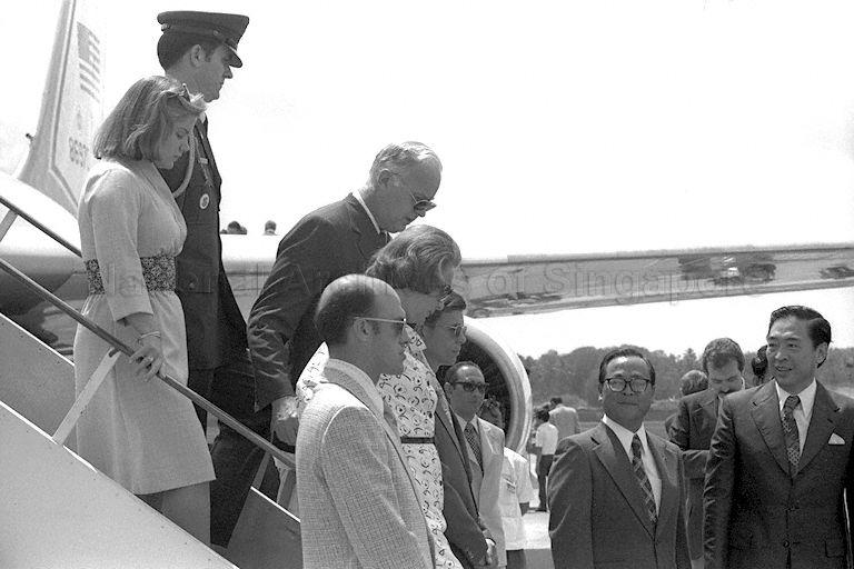 Mrs Margarette Rockefeller and youngest daughter Malinda (left), accompanied by United States Ambassador to Singapore John Holdridge disembarking from the US Air Force Two Boeing 707 jet at Singapore Paya Lebar Airport. On the right are Speaker of Parliament Dr Yeoh Ghim Seng and Ministry of Foreign Affairs' Chief of Protocol George Seow.