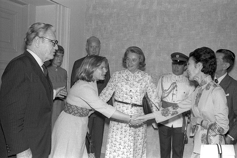 Ms Malinda Fitler Murphy, youngest daughter of Mrs Margarette Rockefeller, being introduced to Mrs Benjamin Sheares by her mother, by her mother during a courtesy call on President Dr Benjamin Henry Sheares at Istana.  On the left are Vice-President of the United States (US) Nelson Rockefeller, US Ambassador to Singapore John Holdridge and his wife.