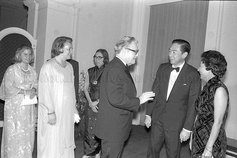 Speaker of Parliament Dr Yeoh Ghim Seng and Mrs Yeoh talking with United States Vice-President Nelson Rockefeller at banquet given in his honour at the Istana. Looking on are Mrs Margarette Rockefeller and daughter Malinda. In the background are Prime Minister Lee Kuan Yew (hidden) and Mrs Lee.