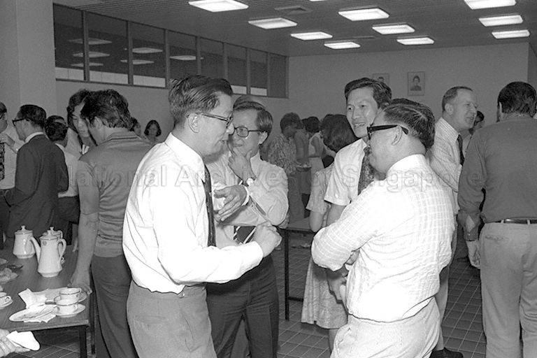 Assistant Commissioner of Police Goh Yong Hong (foreground, second from right) talking to senior civil servants during the opening of Civil Service Staff Development Institute building in Heng Mui Keng Terrace, Pasir Panjang.