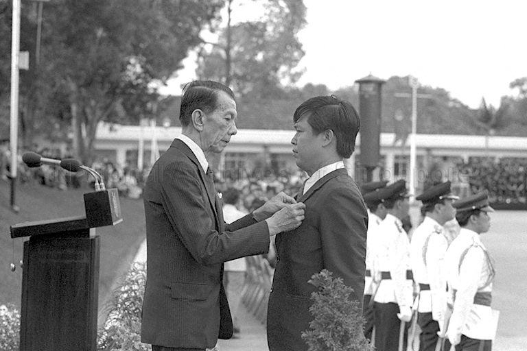 President Dr Benjamin Henry Sheares presenting Police Gallantry Medals during Police Day parade at Police Academy in Thomson Road