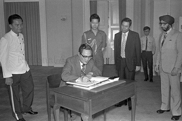 South Korean Foreign Minister Dr Kim Dong Jo, who is on a three-day informal goodwill visit to Singapore, signing guest book upon arrival at Istana to call on President Dr Benjamin Henry Sheares