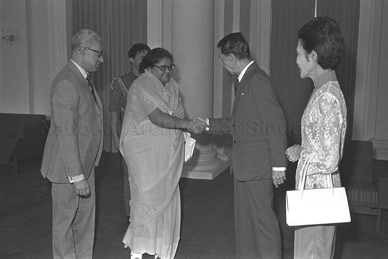 A member of the delegation accompanying Prince Dhirendra of Nepal greeting President Dr Benjamin Sheares during a courtesy call in the Istana