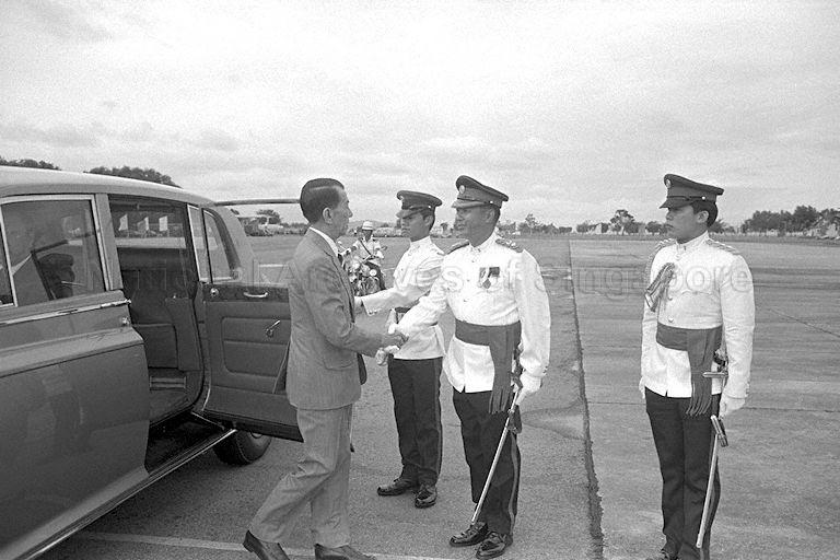 President Dr Benjamin Henry Sheares being greeted by