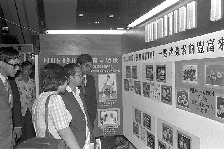 Minister for Health Dr Toh Chin Chye (second from right) touring the Infant and Child Care exhibition organised by Singapore Jaycees at People's Park Complex on its opening