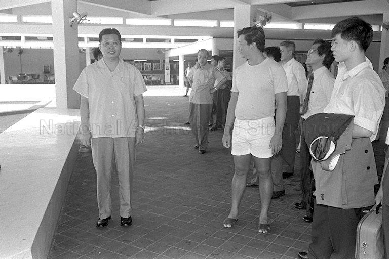 Kwangchow Acrobatic Troupe of China, led by leader Li Wei Ying (left), visiting Toa Payoh Swimming Complex.