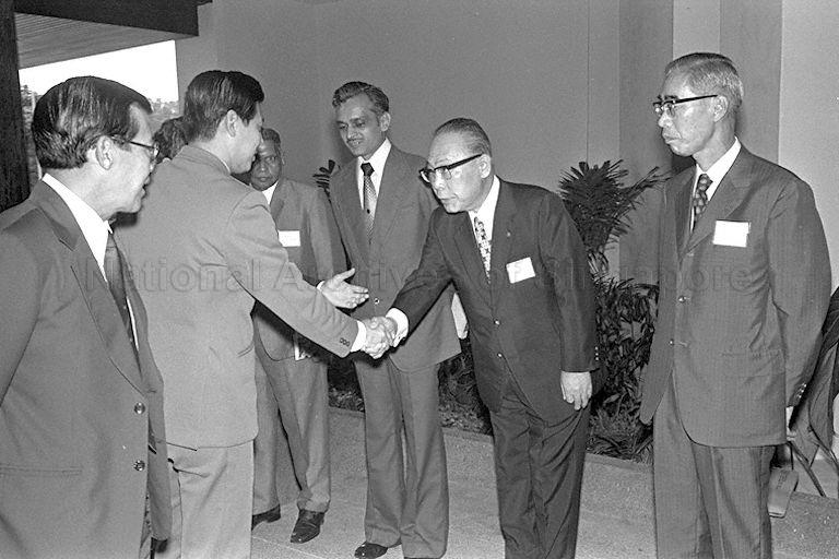 Senior Minister of State for National Development Dr Tan Eng Liang (foreground, second from left) being greeted on his arrival for opening of International Touring Alliance (AIT) Asian Pacific Region general assembly at Regional English Language Centre in Orange Grove Road