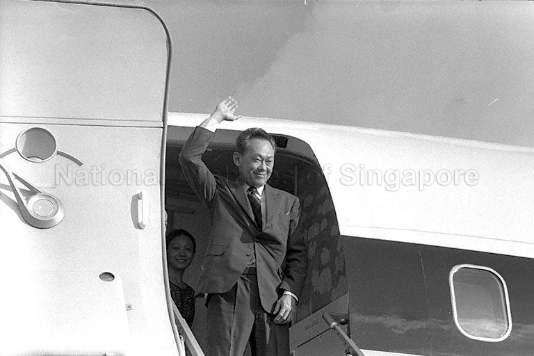 Prime Minister Lee Kuan Yew waving from the aircraft at Singapore Paya Lebar Airport before his departure for Jakarta, Indonesia