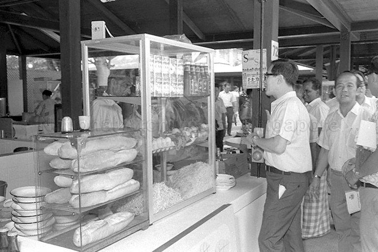 Parliamentary Secretary to Ministry of Labour Fong Sip Chee touring Empress Place Food Centre during its opening