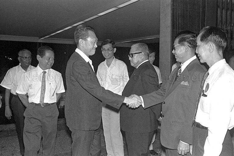 Prime Minister Lee Kuan Yew being greeted upon his arrival for variety show presented by the Chin Woo (Athletic) Association at National Theatre. The variety show was held to raise funds for activities of Tanjong Pagar and Duxton Plain community centres.