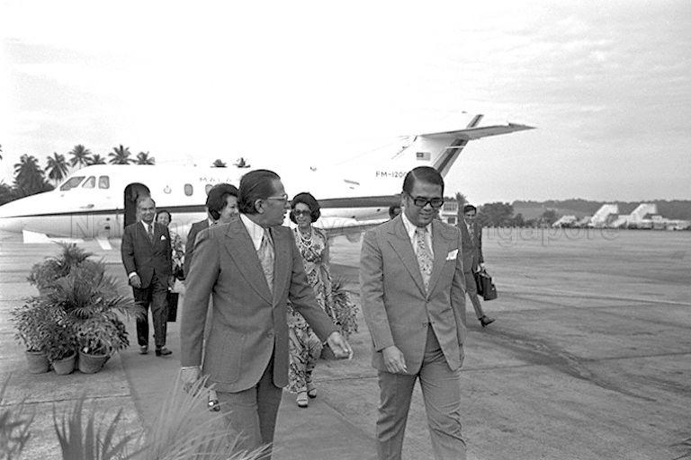Malaysian High Commissioner to Singapore Datuk Abdullah bin Ali (left) with Malaysian Minister with Special Functions Michael Chen, a member of the Malaysian delegation accompanying Malaysian Prime Minister Tun Abdul Razak at Paya Lebar Airport who are here for a three-day official visit to Singapore