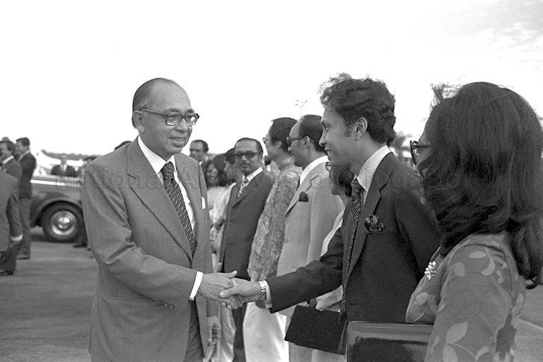Malaysian Prime Minister Tun Abdul Razak (left) being greeted by members of the diplomatic corps upon his arrival in Singapore for a three-day official visit