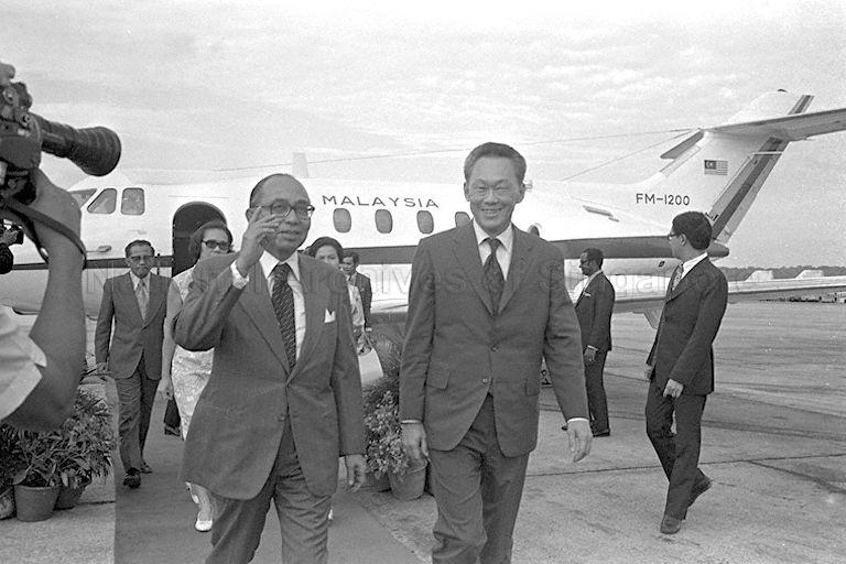 Prime Minister Lee Kuan Yew receiving Malaysian Prime Minister Tun Abdul Razak at Paya Lebar Airport. The latter is on a three-day official visit to Singapore.