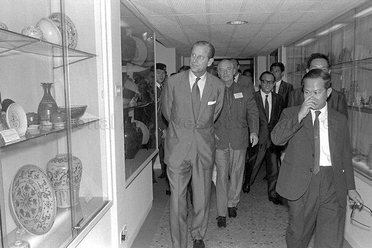 Duke of Edinburgh Prince Philip, accompanied by Vice-Chancellor of University of Singapore and Minister for Science and Technology Dr Toh Chin Chye (right), touring the university