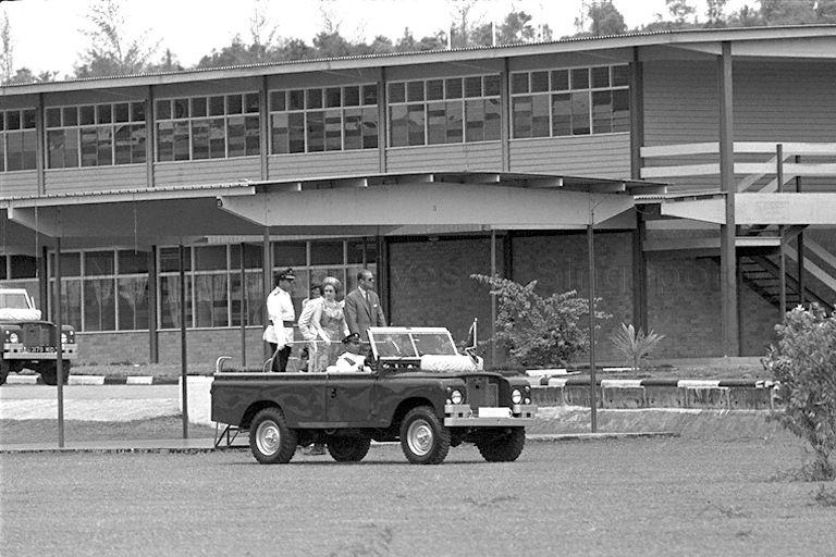 Queen Elizabeth II and Duke of Edinburgh Prince Philip making their round of Singapore Armed Forces Training Institute (SAFTI) on a ceremonial Land Rover. They were on a three-day state visit to Singapore.