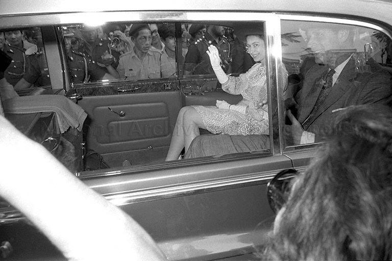 Queen Elizabeth II and Duke of Edinburgh Prince Philip leaving the housing estate of Toa Payoh Lorong 5 after their visit