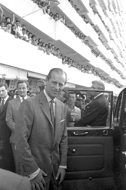 Duke of Edinburgh Prince Philip getting into the car after a tour of Toa Payoh housing estate