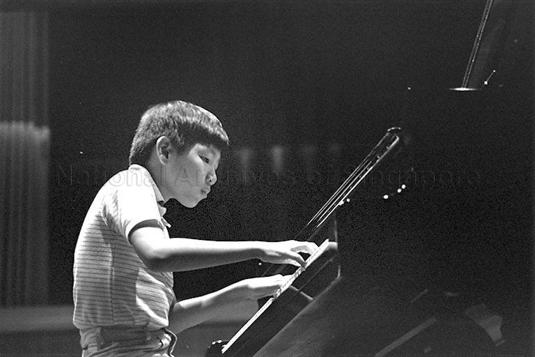 Seow Fou Chen performing on the piano during third National Music Competition at Victoria Concert Hall